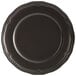 An Acopa Condesa black porcelain plate with a scalloped rim.