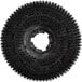 A circular black Lavex floor scrubbing brush with black bristles.