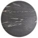 A black and white marbled Lancaster Table & Seating Excalibur round table top.