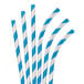 A close-up of Aardvark blue and white striped paper straws.
