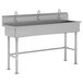 A stainless steel Advance Tabco utility sink with three electronic faucets.