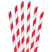 A group of Aardvark red and white striped paper straws.