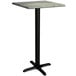 A Lancaster Table & Seating square bar height table with a black base.