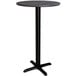 A Lancaster Table & Seating black bar height table with a black metal base.