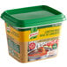 A container of Knorr Ultimate Lobster Bouillon Base with a green lid.