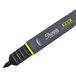 A close up of a yellow and black Sharpie Pro marker with a fine bullet tip.