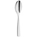 A WMF by BauscherHepp stainless steel serving spoon with a long handle and a silver spoon bowl.