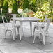 Lancaster Table & Seating Alloy Series 36" x 36" Silver Dining Height Outdoor Table with 4 Industrial Cafe Chairs Main Thumbnail 1