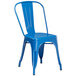 A blue metal Lancaster Table & Seating outdoor chair.