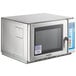 A Solwave stainless steel commercial microwave with a window.