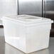 A Carlisle white plastic food storage box with a lid.