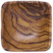 An Elite Global Solutions wood grain patterned square ramekin.