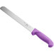A Choice bread knife with a purple handle.