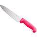 A Choice chef knife with a neon pink handle.