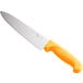 A white knife with a yellow handle.