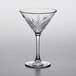 A Pasabahce Timeless Vintage martini glass with a design on it.