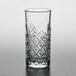 A close-up of a Pasabahce long drink glass with a diamond pattern.