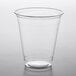 A clear EcoChoice PLA compostable plastic cup on a white surface.