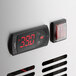 A digital thermostat with red numbers on a CPG Chef Base.