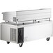 A stainless steel Cooking Performance Group chef base on wheels.
