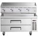 A stainless steel Cooking Performance Group gas countertop griddle with a refrigerated base with drawers.