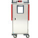 A stainless steel Metro C5 heated holding cabinet with red analog controls and wheels.