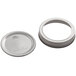 A silver metal lid and band for Kerr regular mouth canning jars.