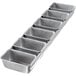 A Chicago Metallic metal bread loaf pan with six compartments.