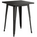 A black square Lancaster Table & Seating metal table with legs.