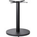 A NOROCK black powder-coated steel round table base.