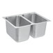 A silver stainless steel Vollrath double bowl sink with two compartments.
