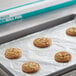 A tray of Choice aluminum foil wrapped cookies on a baking sheet.