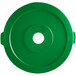 A green Lavex circular lid with a hole in it.