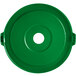 A green plastic lid for a Lavex recycling can with a hole in the center.