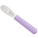 A purple Mercer Culinary sandwich spreader with a scalloped edge and a handle.