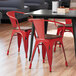 Lancaster Table & Seating Alloy Series Distressed Red Metal Industrial Cafe Arm Chair with Vertical Slat Back and Walnut Wooden Seat Main Thumbnail 1