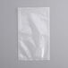 A white plastic bag of Choice Chamber Vacuum Packaging Pouches on a gray background.