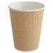 A brown paper cup with a white ripple rim.