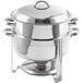 A stainless steel round soup chafer with chrome accents and a lid.