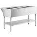 A ServIt natural gas steam table with an open well for four stainless steel food containers.
