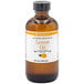 A bottle of LorAnn Oils 4 fl. oz. All-Natural Lemon Super Strength Flavor on a store counter.