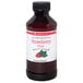 A bottle of LorAnn Oils Strawberry Super Strength Flavor syrup.