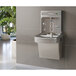 An Elkay light gray wall-mounted water fountain with a faucet.