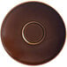 A brown RAK Porcelain saucer with a glossy finish and a circle in the middle.