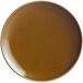 A brown porcelain coupe plate with a white border.