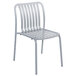 A gray BFM Seating Key West outdoor side chair with a slatted back.