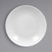 A close-up of a RAK Porcelain Soul deep coupe porcelain plate with a textured edge.