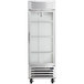A silver Beverage-Air reach-in freezer with glass doors.
