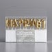 A plastic package of gold foil "Happy Birthday!" candle picks with a white label.