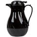 A black thermal coffee carafe with a handle and lid.